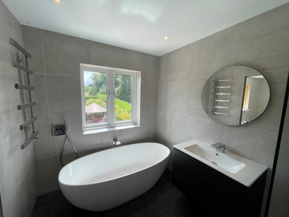 Bathroom refurbishment completed in Sutton by local plumber