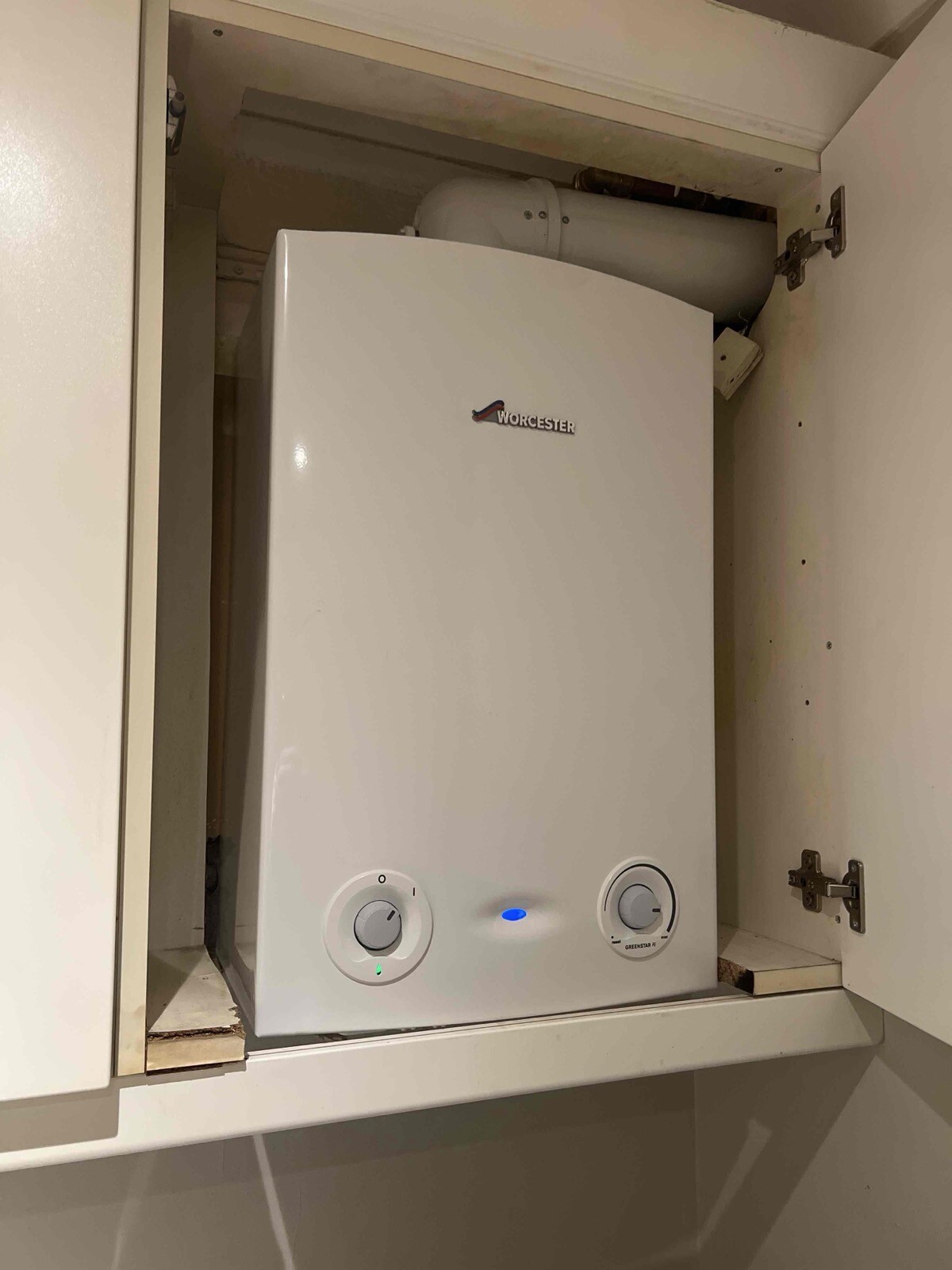 Boiler installation inside cupboard in Epsom by Gas Safe engineer
