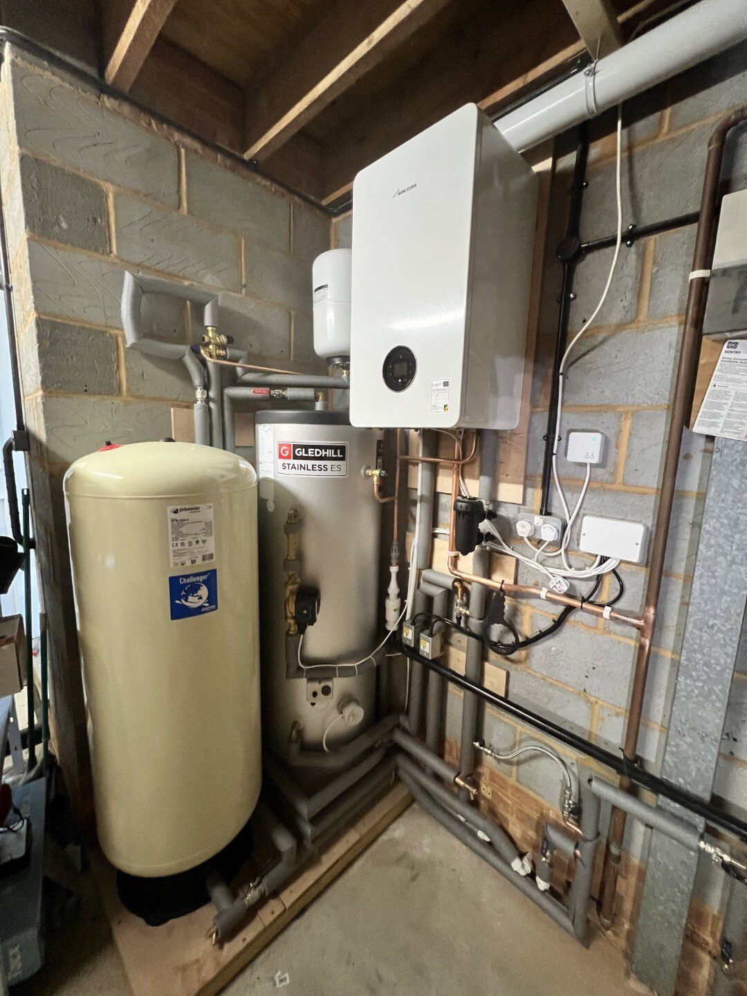 Boiler Installation & Servicing Gas Safe engineer installing a domestic boiler system in Epsom