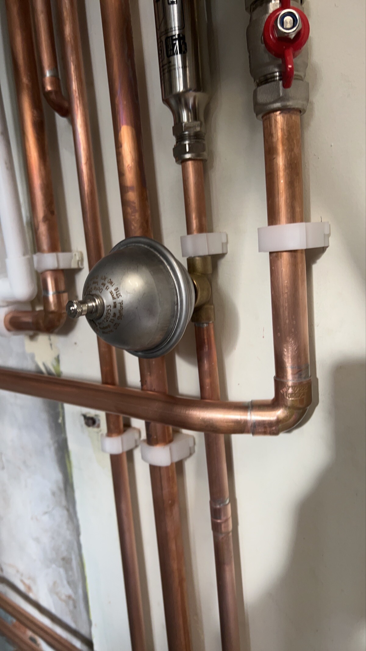 Gas boiler pipework and copper connections installed in Epsom home