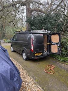 Local plumber van in Epsom on site job