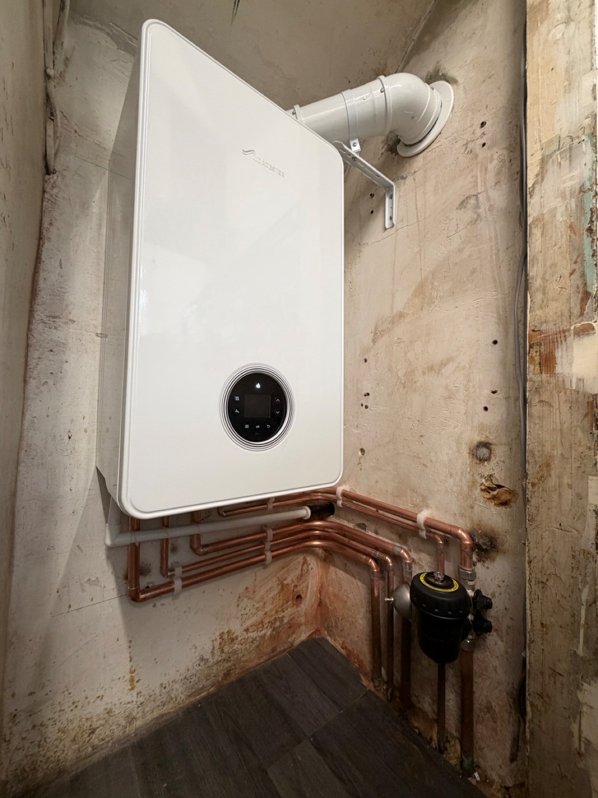 New Boiler installed in Ewell - Moving to back wall for access