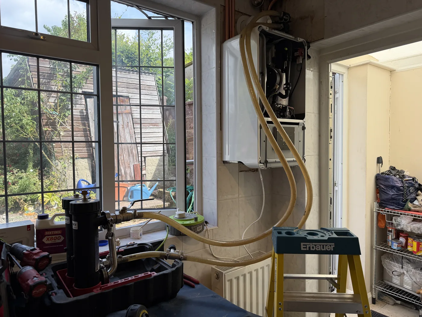 Heating system cleaning during Worcester combi boiler conversion in Banstead