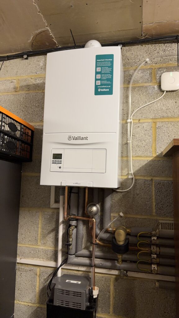 Finished Vaillant boiler installation in Sutton with pipework and system filter