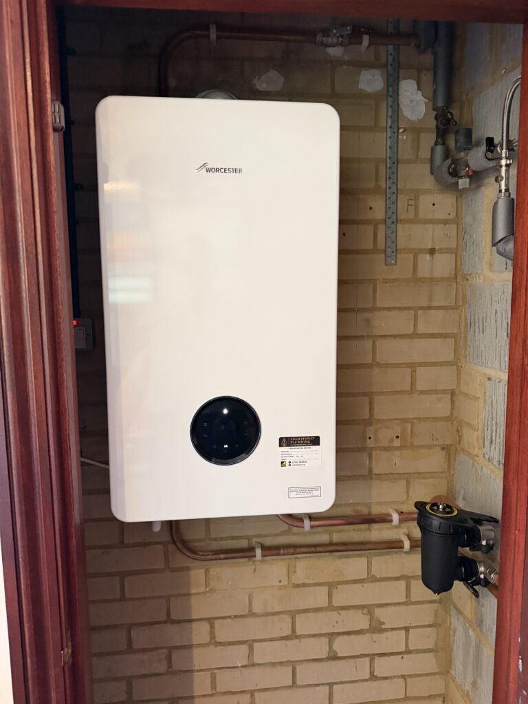 New Worcester Bosch 8000 system boiler and Worcester system filter installed in Cheam